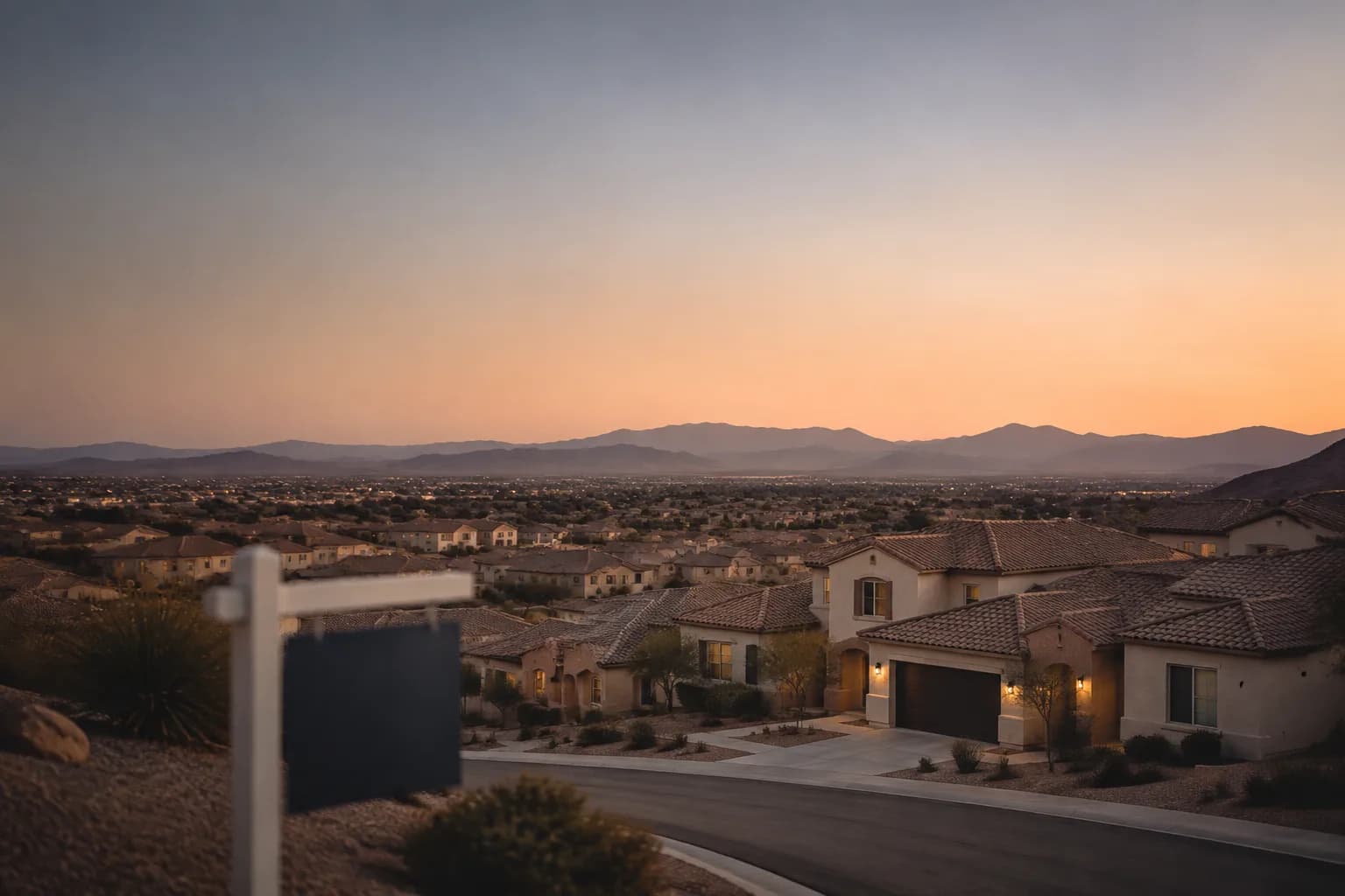 Desert suburban neighborhood representing the Phoenix housing market's mix of rising sales and shrinking inventory in 2026